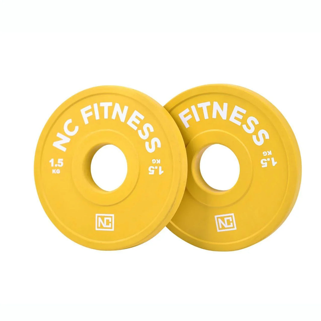 Two yellow NC Fitness 1.5kg bumper weight plates