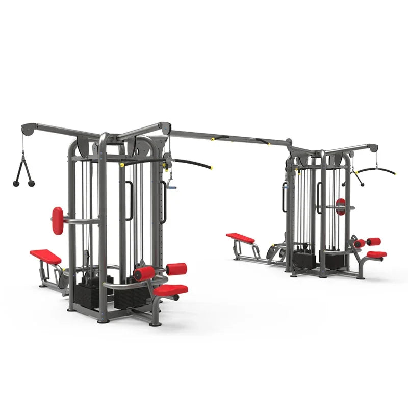 Commercial multi-station cable machine with red upholstery for strength training.