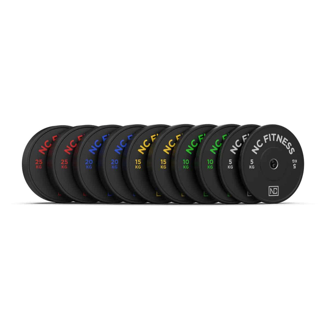 Set of NC Fitness bumper weight plates in various weights from 5kg to 25kg.
