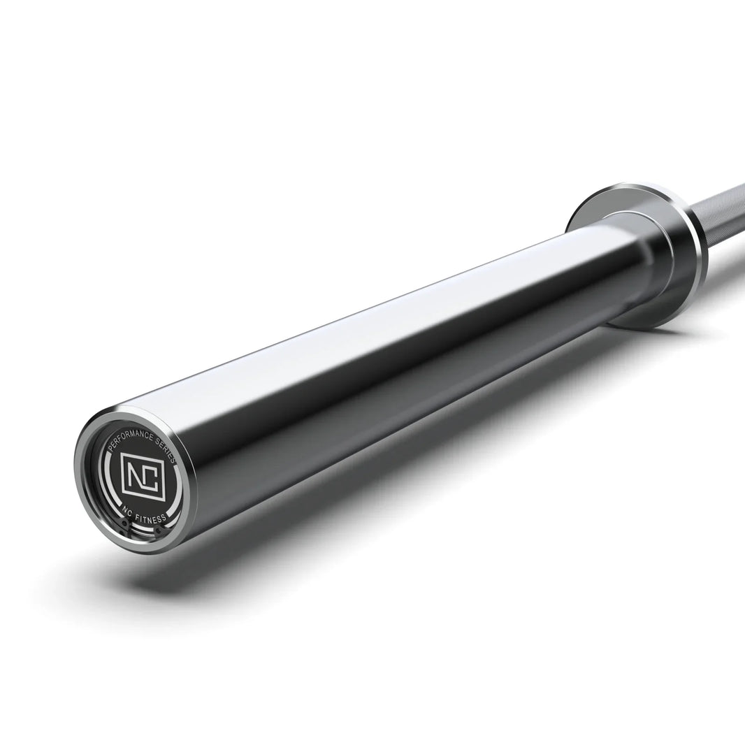 Close-up of a chrome NC Fitness Performance Series barbell sleeve on a white background.
