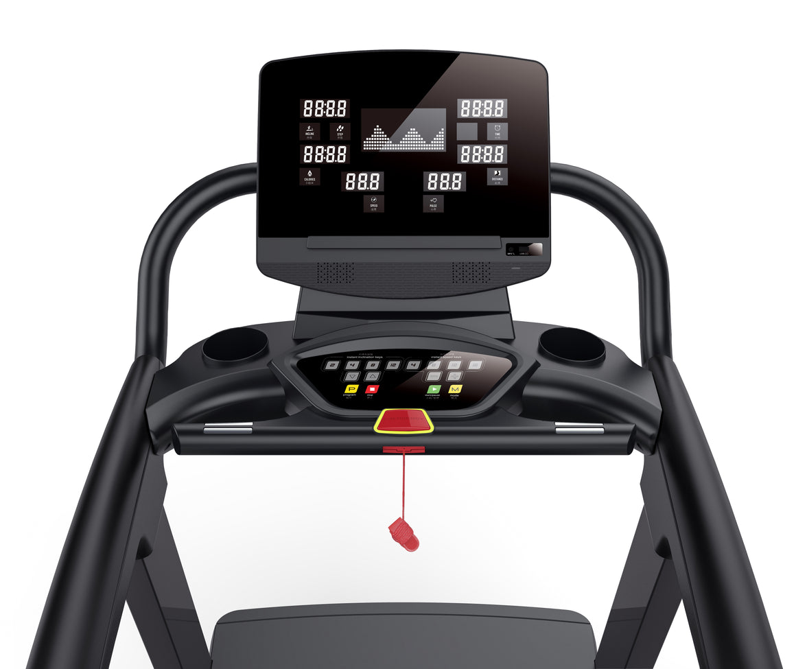 Close-up of a commercial treadmill console with a digital display and control panel.