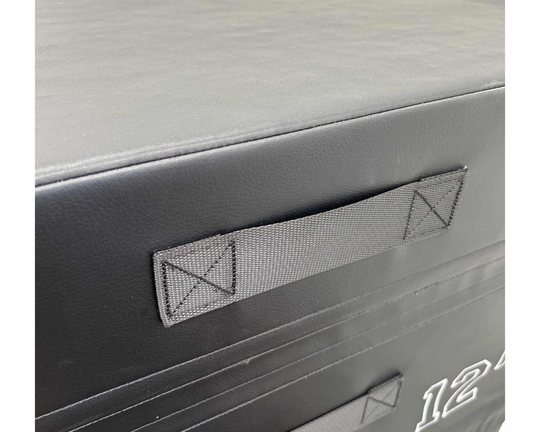 Close up of the sturdy handles on the black three in one plyometric boxes