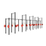 Commercial gym power rack system with pull-up bars and red Olympic weight plates